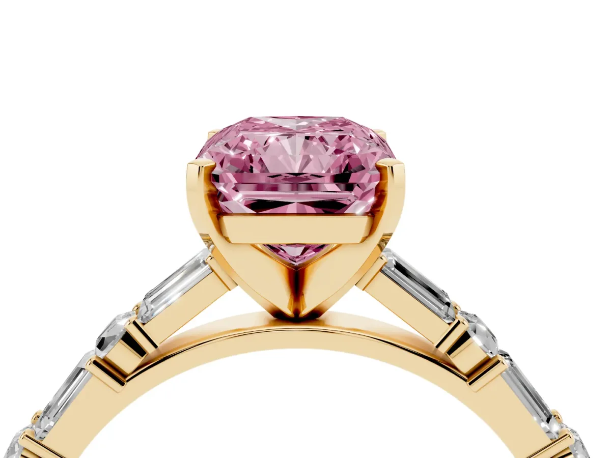 Fancy Pink Radiant Cut Diamond Solitaire with Side Baguettes and Channel Set Band Yellow gold