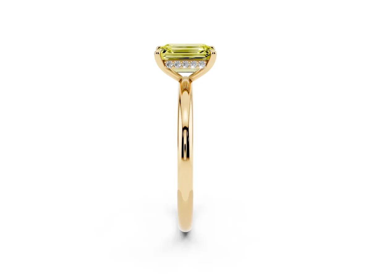 Fancy Yellow Emerald Cut Diamond Solitaire Ring with Thin Band and Four-Prong Setting Yellow gold