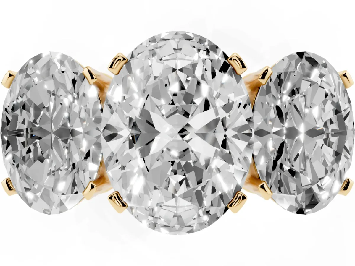 Three-Stone Oval Cut Cut Diamond Ring with Channel Set Band and Four-Prong Setting Yellow gold