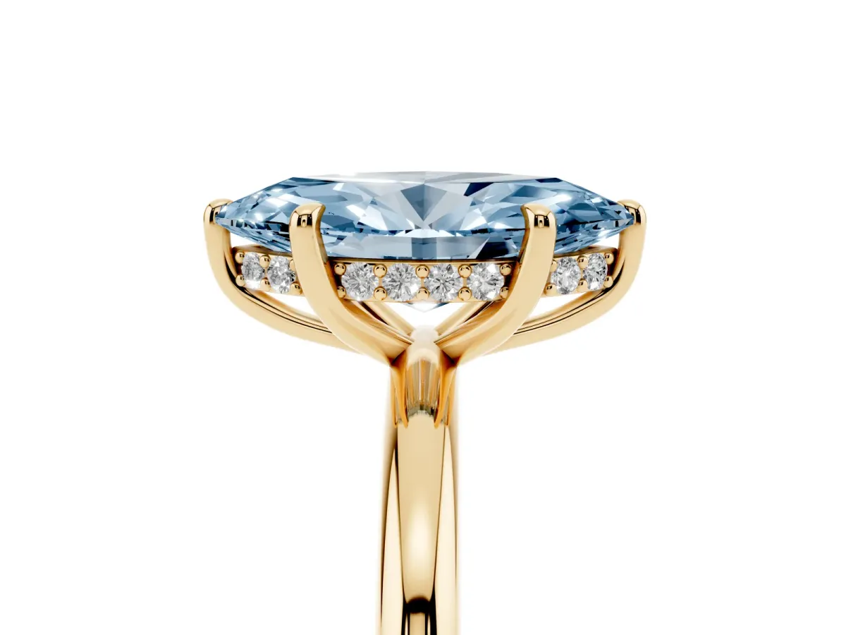 Fancy Blue Marquise Cut Diamond Solitaire Ring with Thin Band and Four-Prong Setting Yellow gold