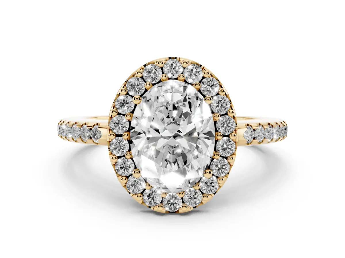 Oval Cut Diamond Pavé Halo Ring with Four-Prong Setting Yellow gold