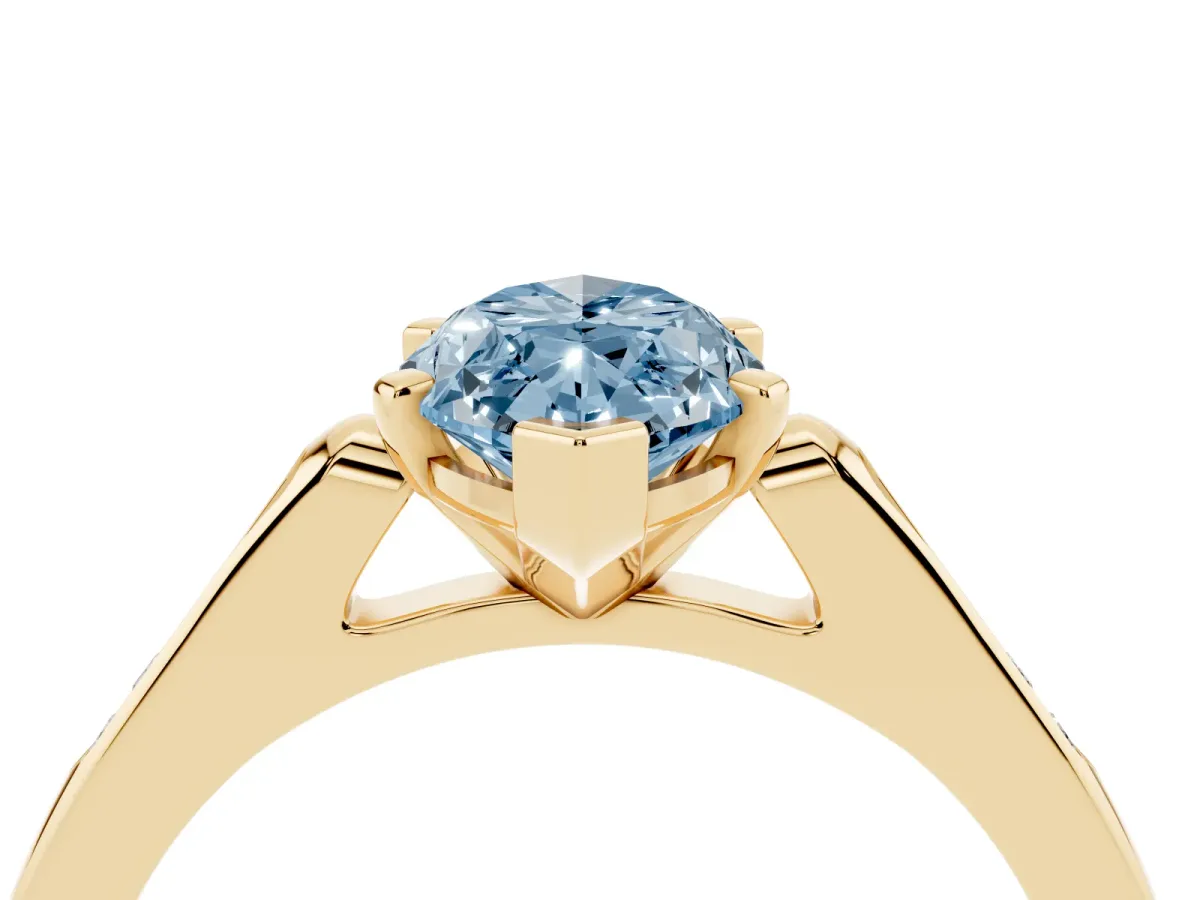Fancy Blue Marquise Cut Diamond Solitaire Ring with Channel Set Round Band and Prong Setting Yellow gold