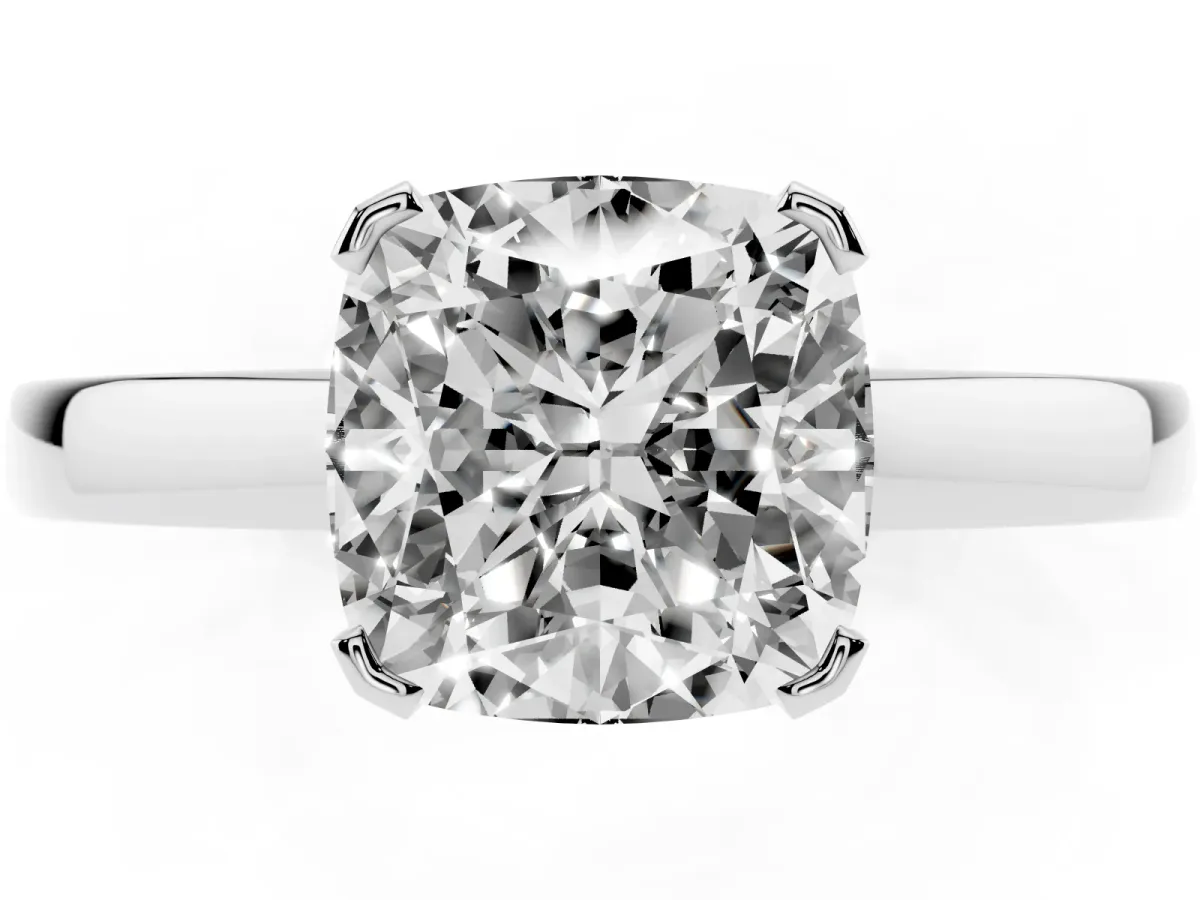 Cushion Cut Cut Solitaire Ring with Four-Prong Setting and Classic Band Silver