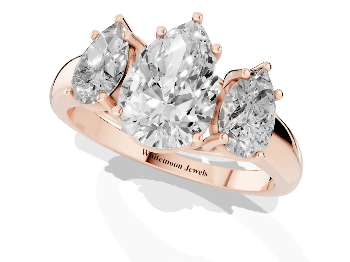 Three-Stone Pear Cut Diamond Engagement Ring with Prong Setting Rose gold