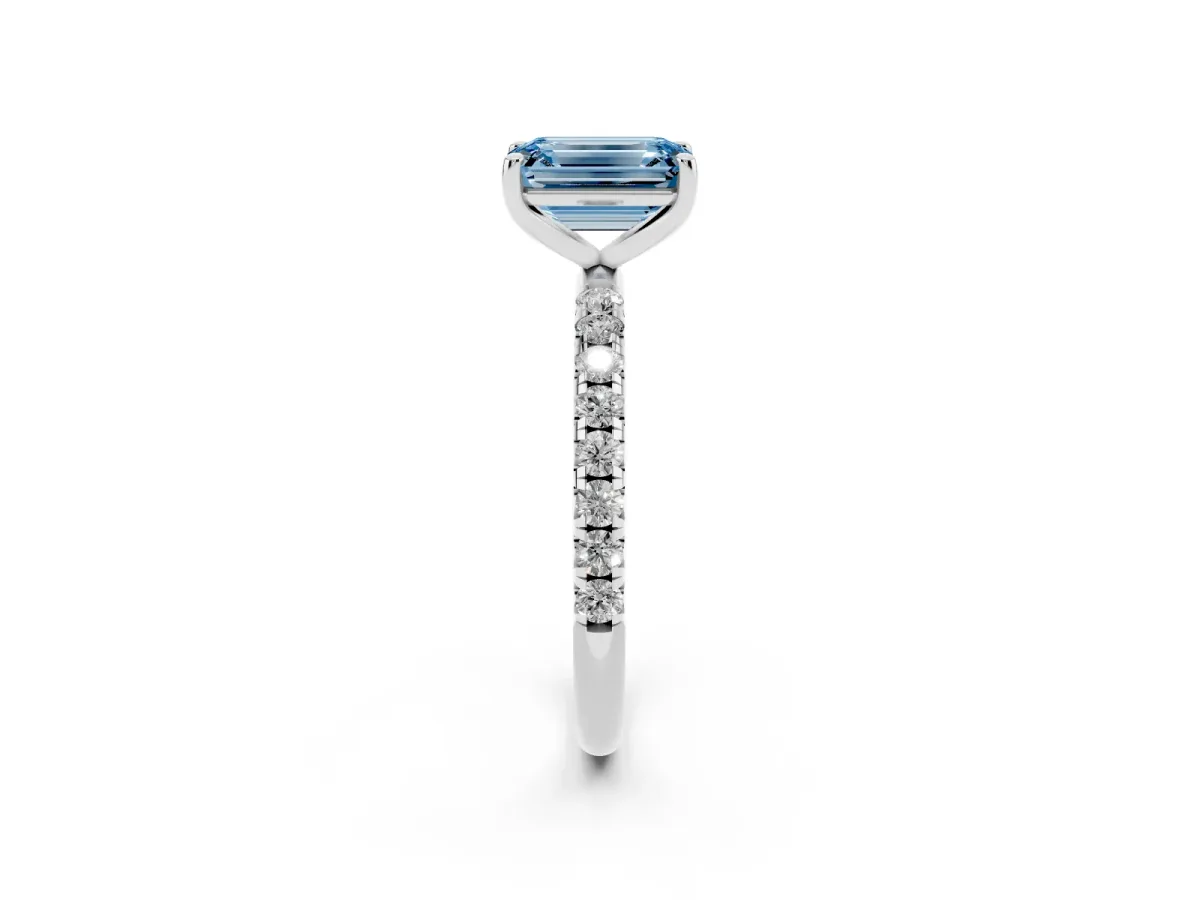 Fancy Blue Emerald Cut Cut Diamond Solitaire Ring with Micro Pave Band and Four Prong Setting Silver