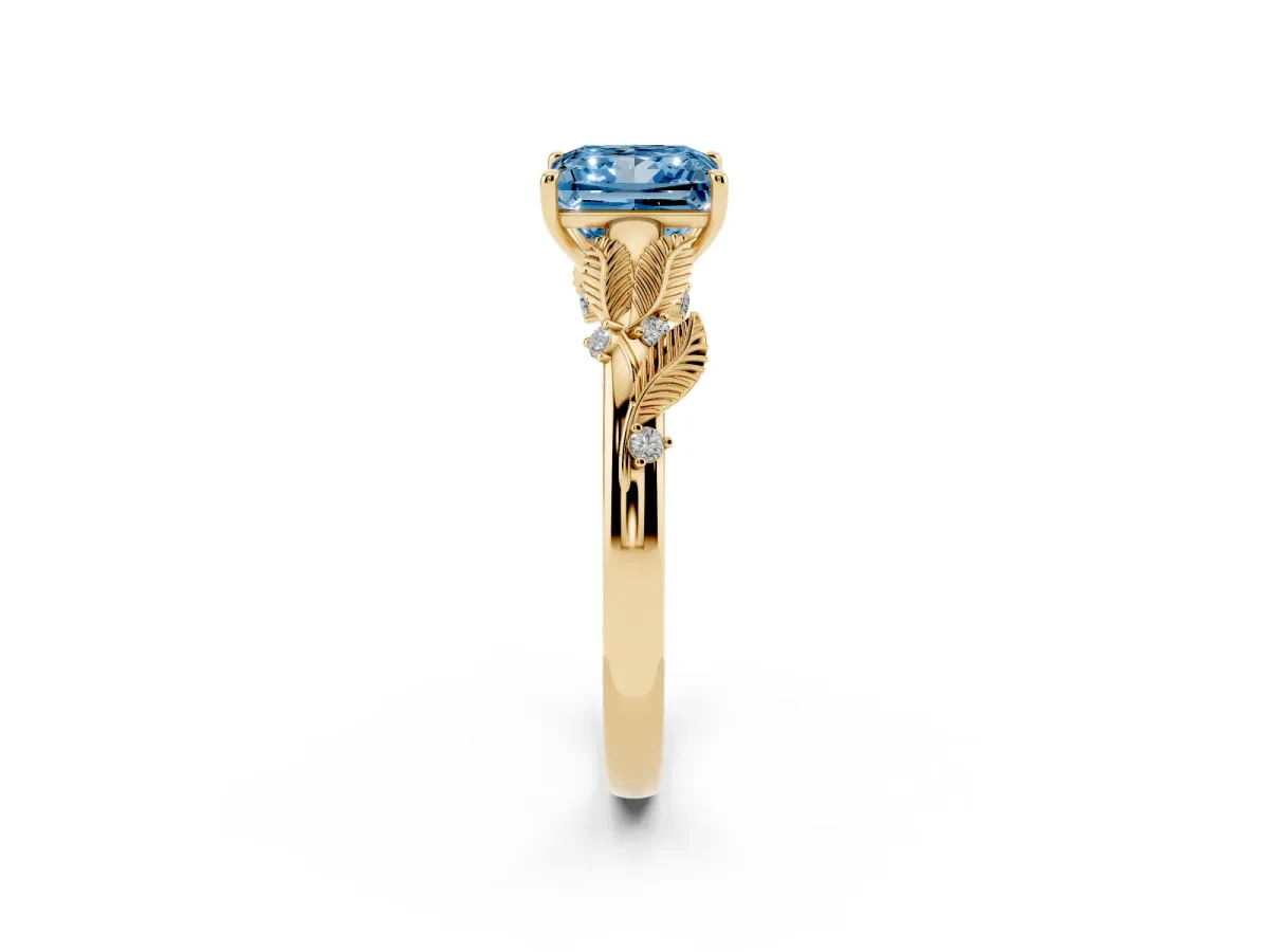 Fancy Blue Princess Cut Diamond Solitaire Ring with Leaf Motif Band and Four-Prong Setting Yellow gold