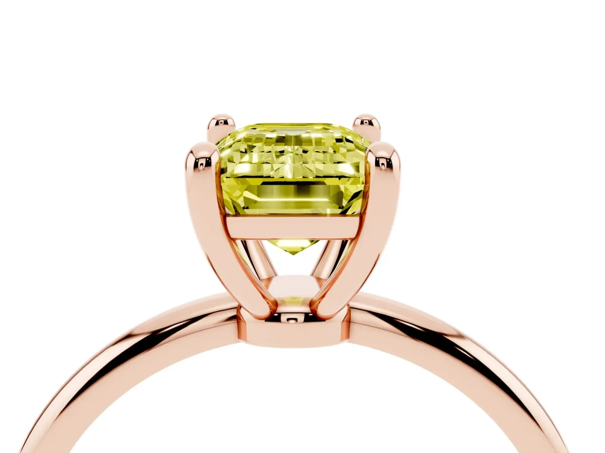 Fancy Yellow Emerald Cut Solitaire Diamond Ring with 4-Prong Setting on a Classic Band Rose gold