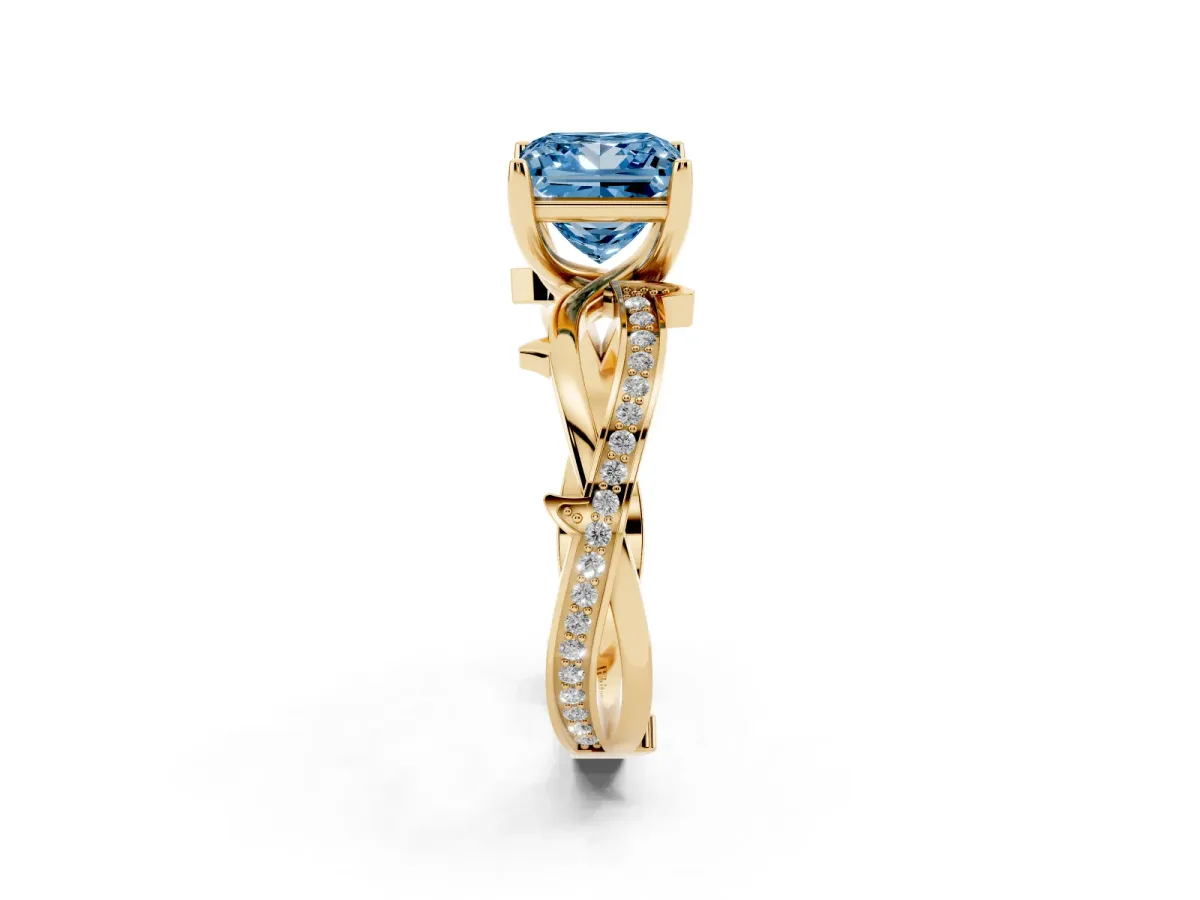 Fancy Blue Princess Cut Solitaire Twist Band with Pavé Accents and Four-Prong Setting Yellow gold