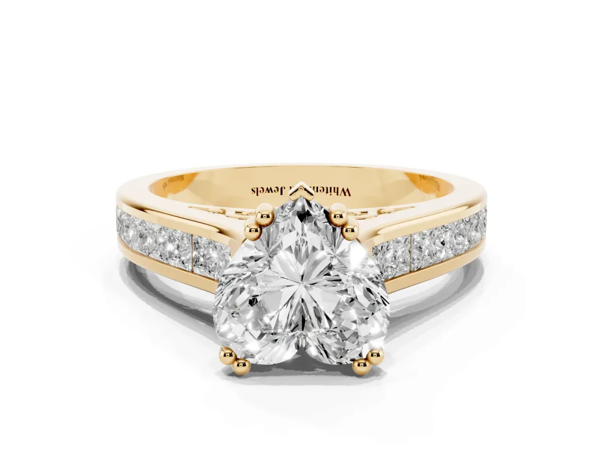 Heart Cut Cut Channel Set Solitaire Engagement Ring with Prong Setting Yellow gold