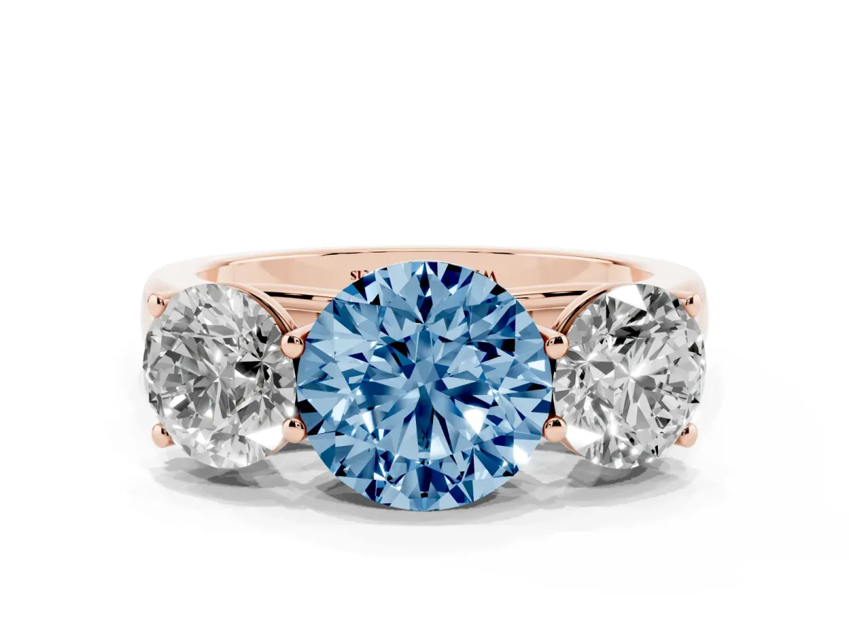 Fancy Blue Round Cut Three-Stone Diamond Ring with Prong Setting on a Classic Band Rose gold