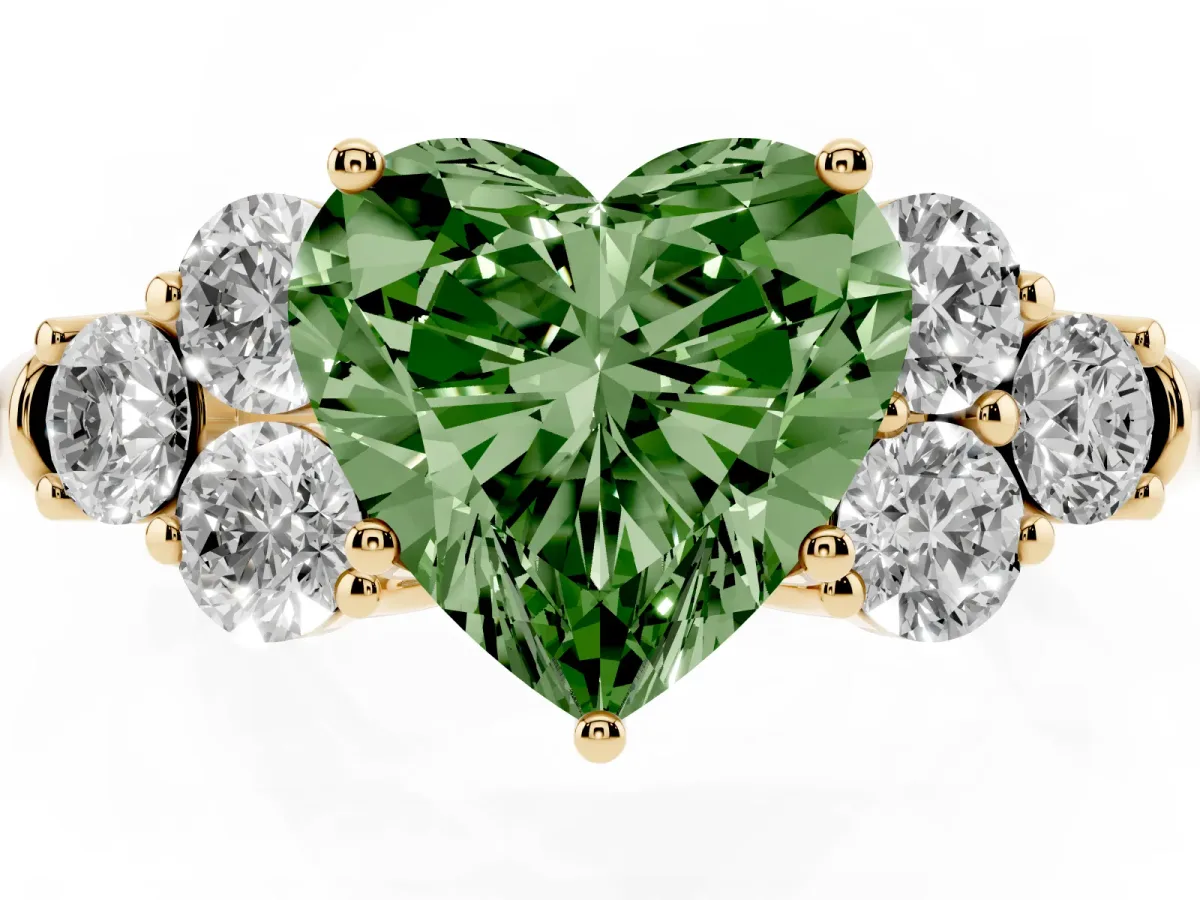 Fancy Green Heart Cut Cut Diamond Cluster Ring with Round Accent Stones and Prong Setting on a Classic Band Yellow gold