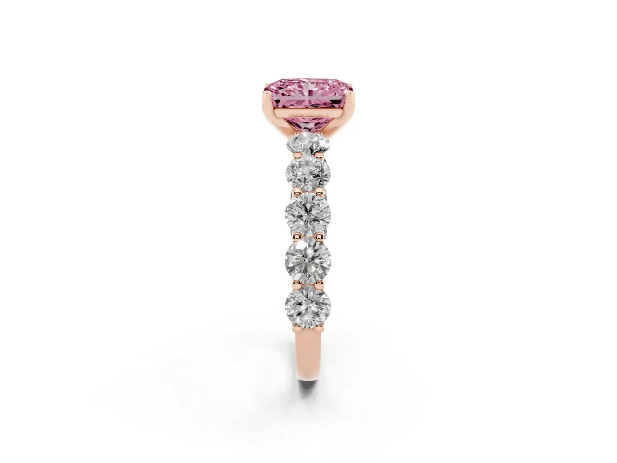 Fancy Pink Radiant Cut Diamond Prong Setting with Side Stones on a Pave Band Rose gold