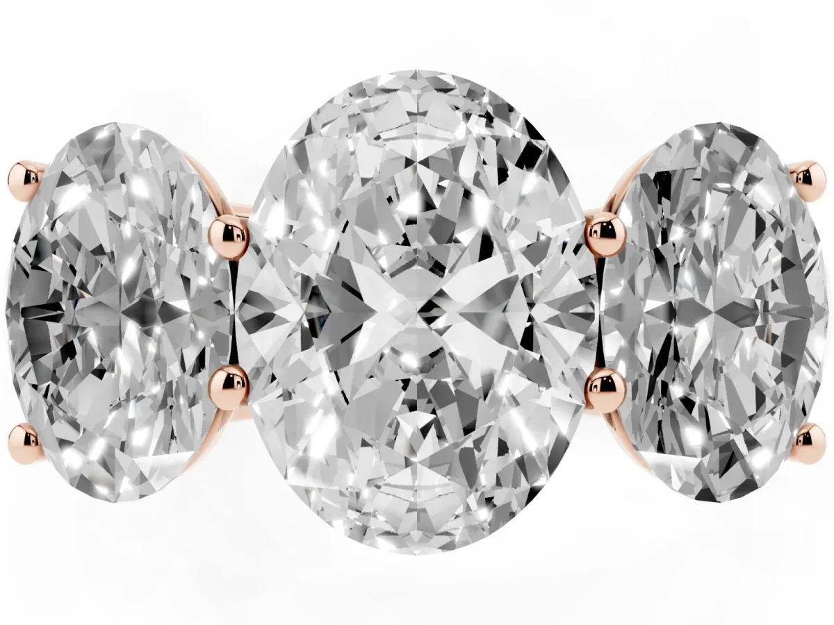 Oval Cut Three-Stone Diamond Ring with Prong Setting on a Classic Band Rose gold