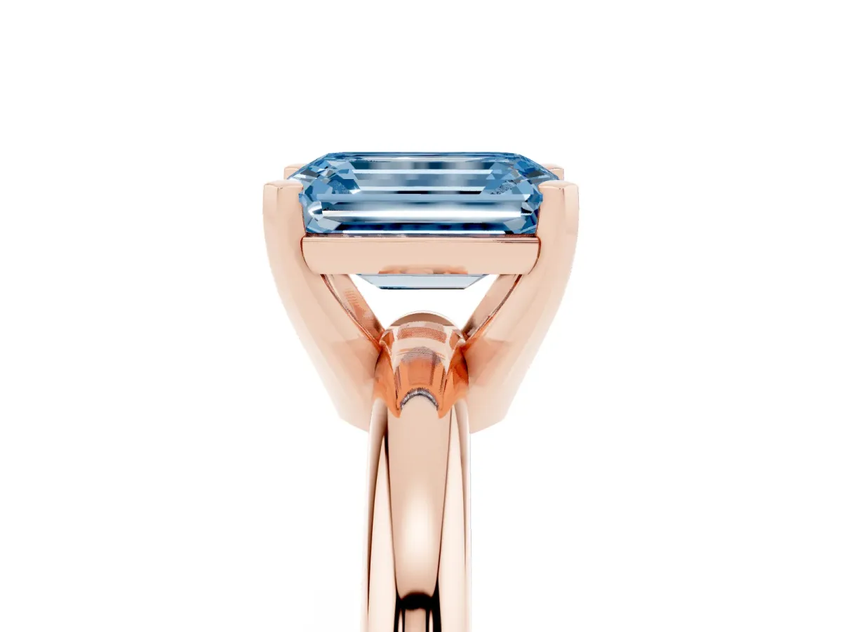 Fancy Blue Emerald Cut Diamond Solitaire Engagement Ring with Round Band and Four-Prong Setting Rose gold