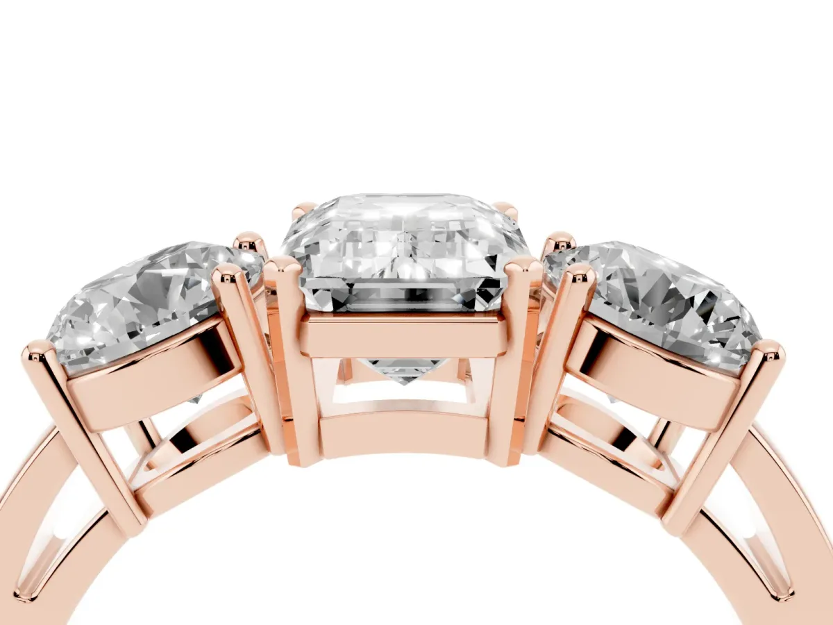 Three-Stone Emerald Cut Diamond Ring with Round Side Stones, Classic Band, and Four-Prong Setting Rose gold