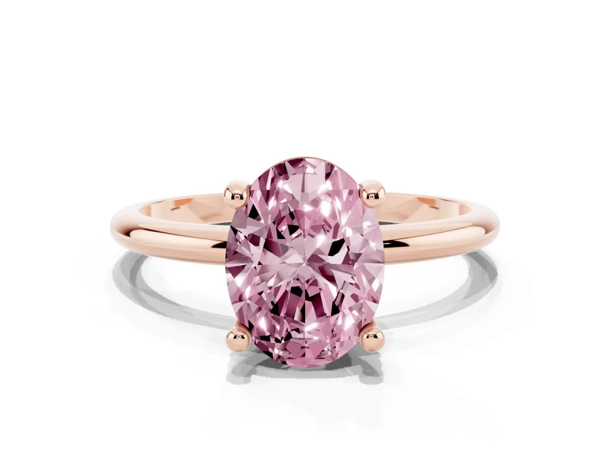Fancy Pink Oval Cut Solitaire Diamond Ring with 4-Prong Setting on a Classic Band Rose gold