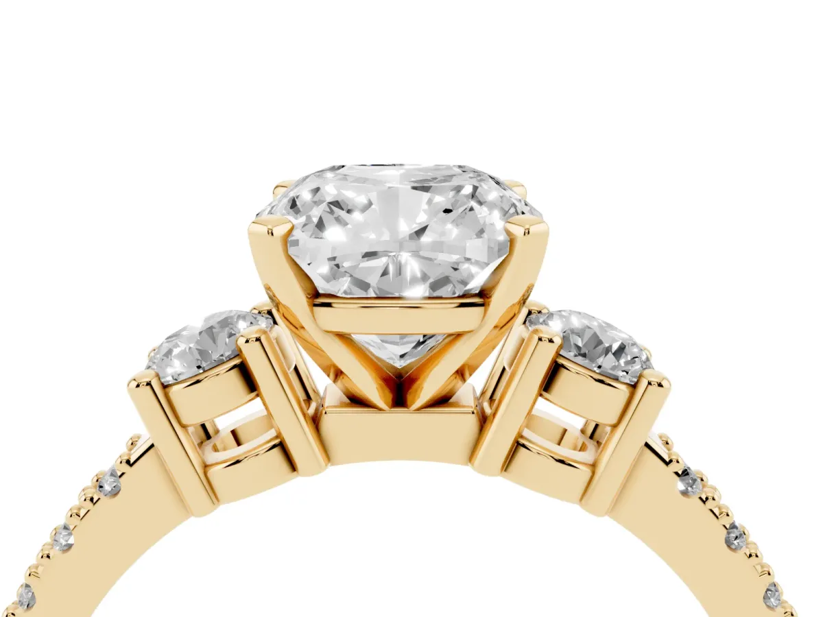 Cushion Cut Three-Stone Diamond Pavé Band with Prong Setting Yellow gold