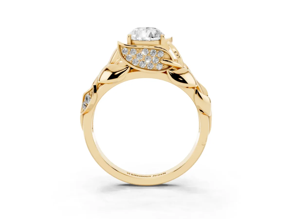 Pear Cut Diamond Leaf-Inspired Engagement Ring with Round Accents and Prong Setting Yellow gold