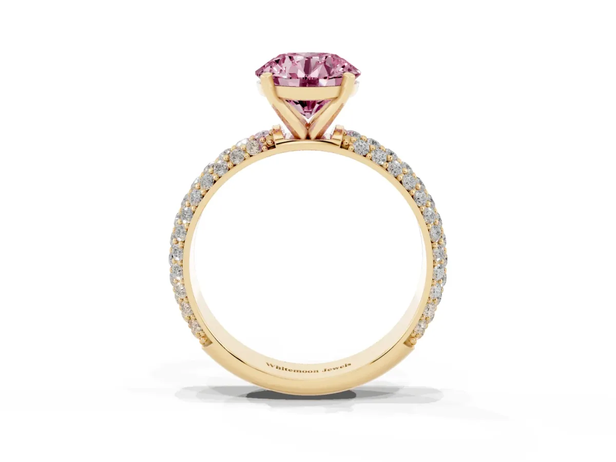 Fancy Pink Round Cut Diamond Solitaire Ring with Prong Setting and Pavé Band Yellow gold