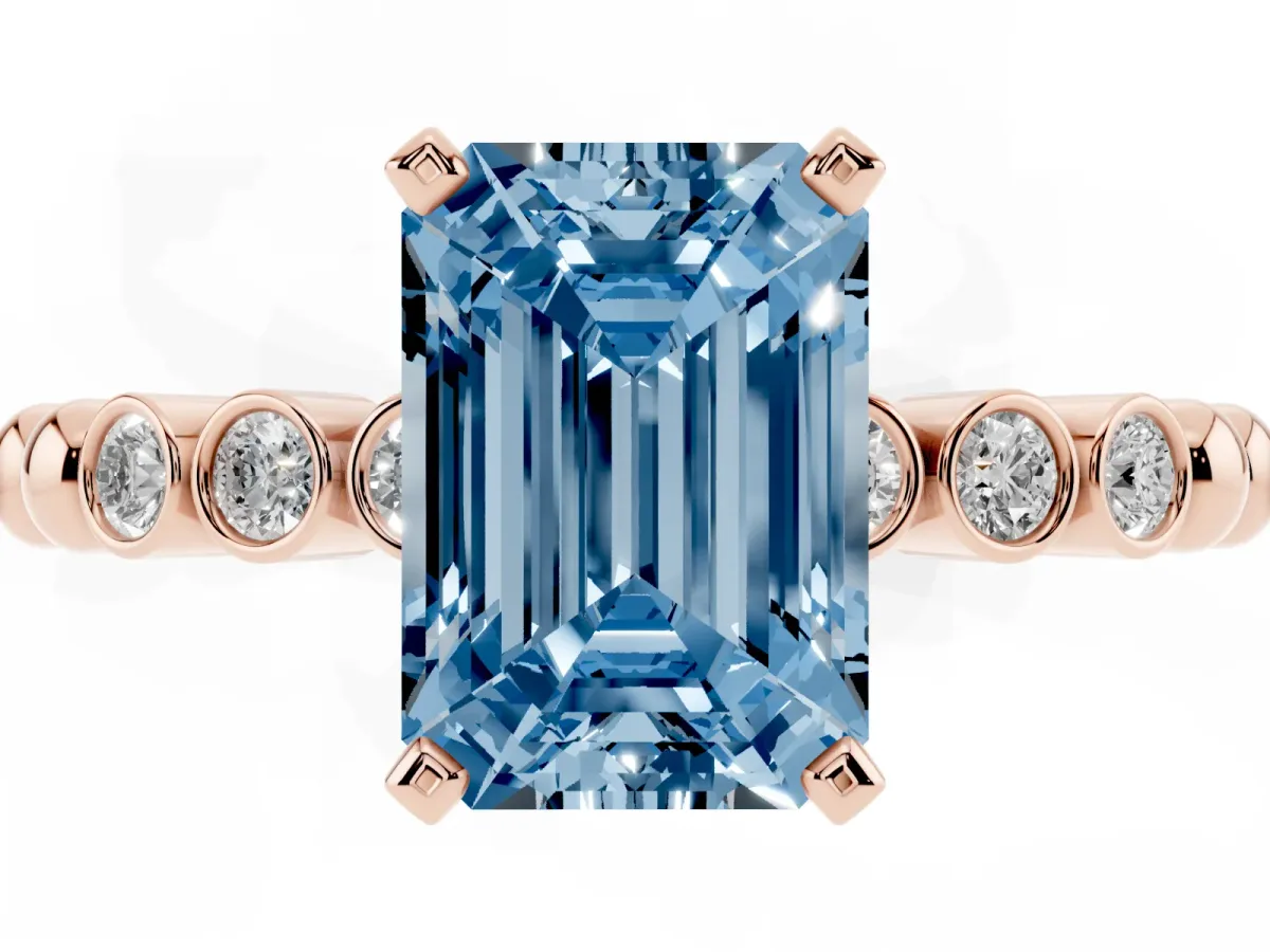 Fancy Blue Emerald Cut Solitaire Bezel Accent Diamond Engagement Ring with Beaded Band and Four-Prong Setting Rose gold