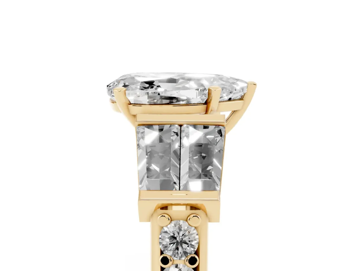 Pear Cut Diamond Engagement Ring with Baguette Side Stones and Channel Set Band Yellow gold