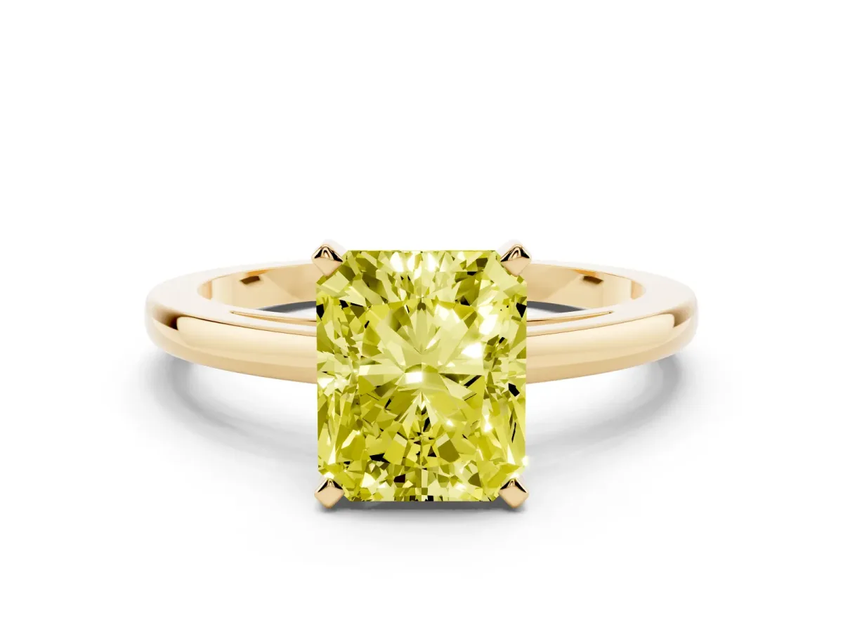 Fancy Yellow Radiant Cut Solitaire Diamond Engagement Ring with Four-Prong Setting on a Classic Band Yellow gold