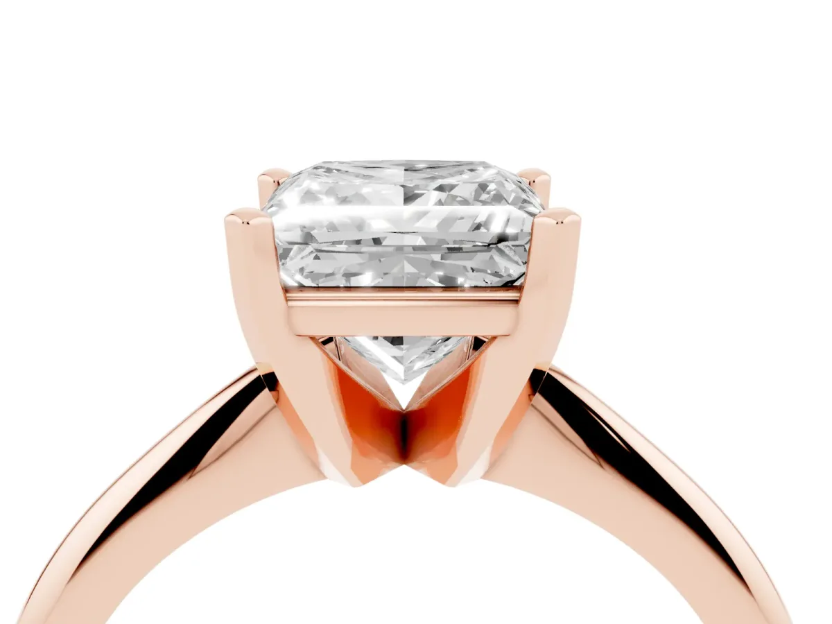 Princess Cut Cut Solitaire Ring with Four-Prong Setting on a Classic Band Rose gold