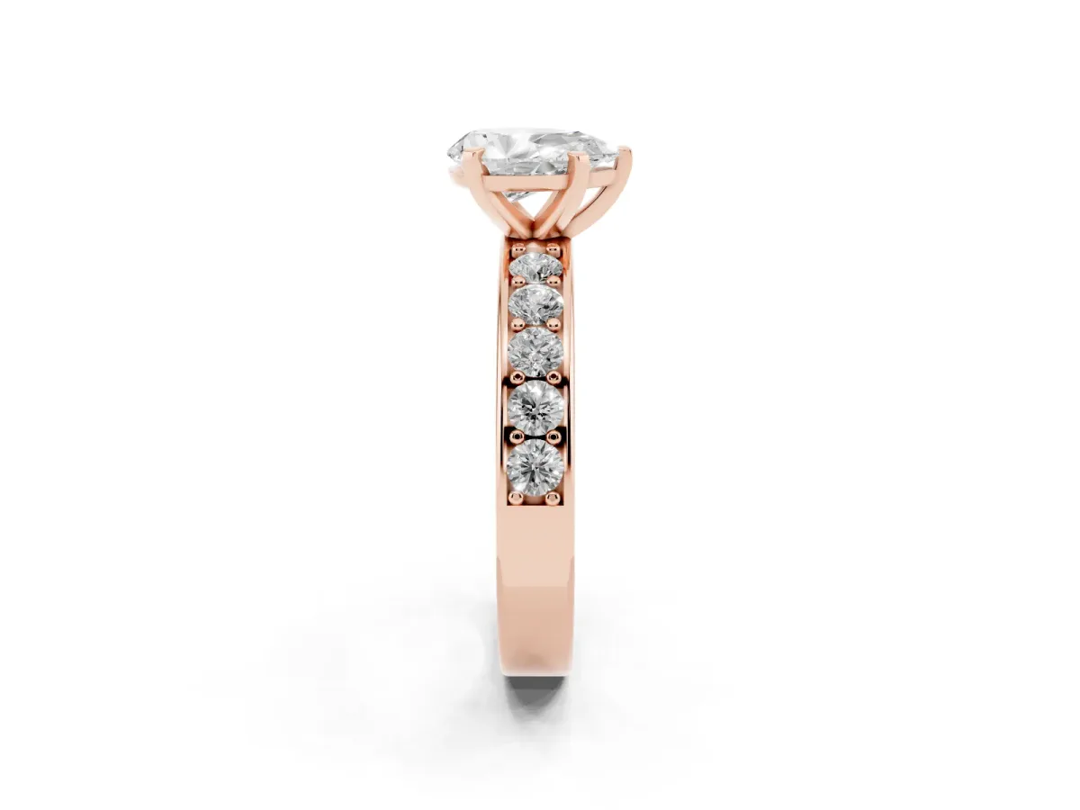 Pear Cut Diamond Engagement Ring with Channel Set Round Band and Prong Setting Rose gold
