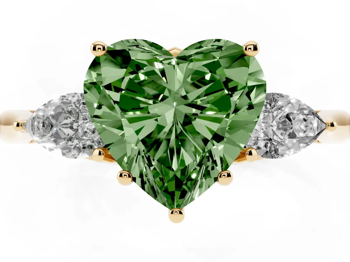 Fancy Green Heart Cut Diamond Three-Stone Ring with Pear Side Stones and Prong Setting Yellow gold