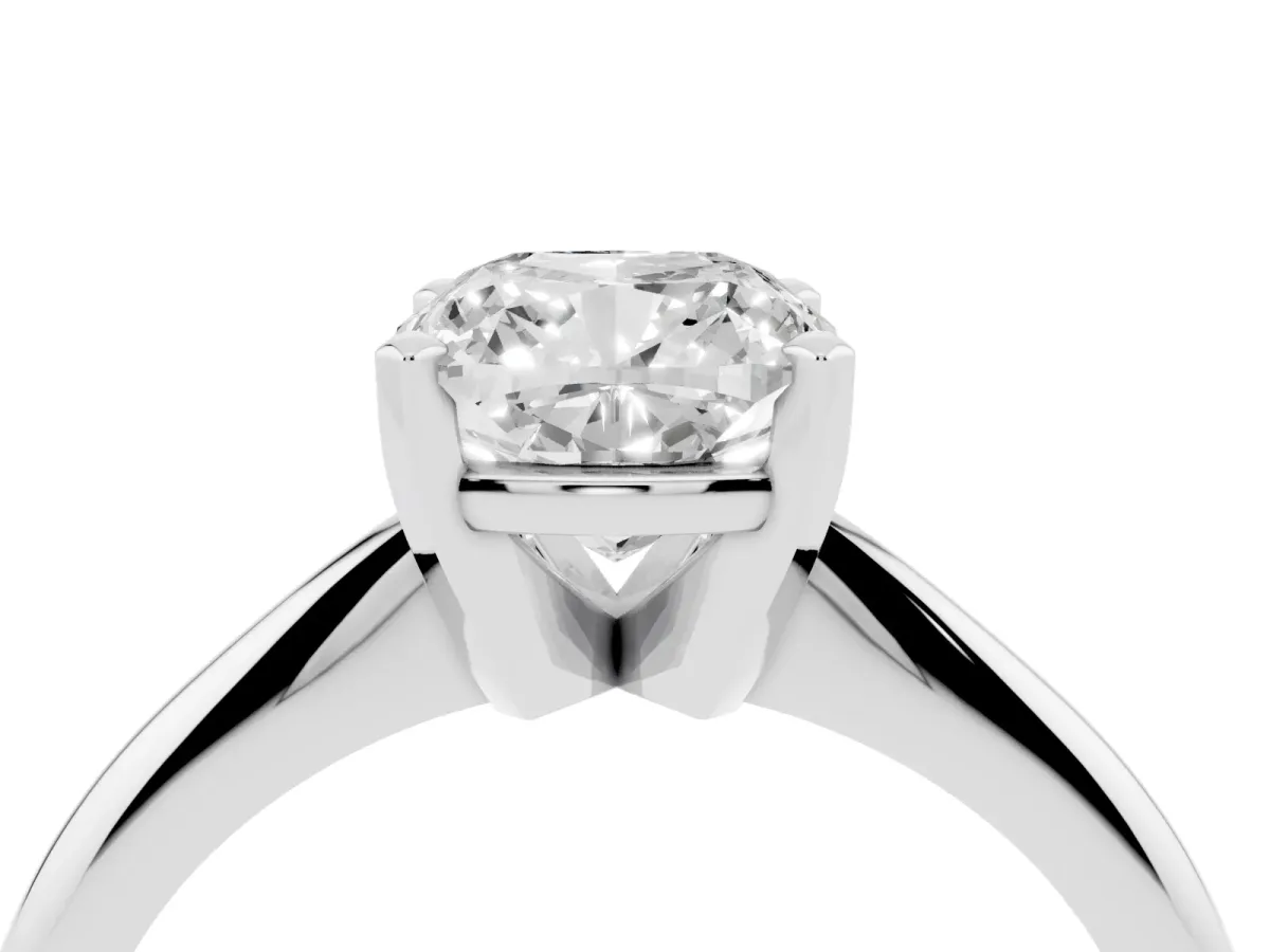 Cushion Cut Cut Solitaire Ring with Four-Prong Setting on a Classic Band Silver