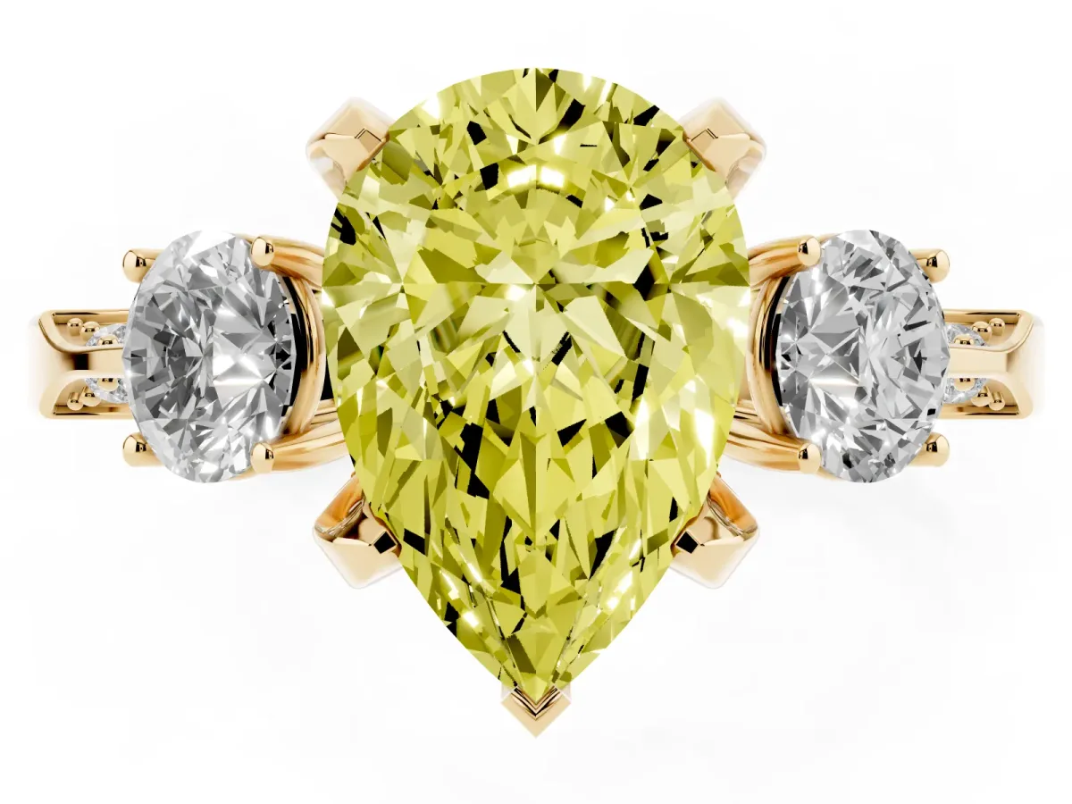 Fancy Yellow Pear Cut Brilliant Three-Stone Diamond Ring with Pavé Band and Four-Prong Setting Yellow gold