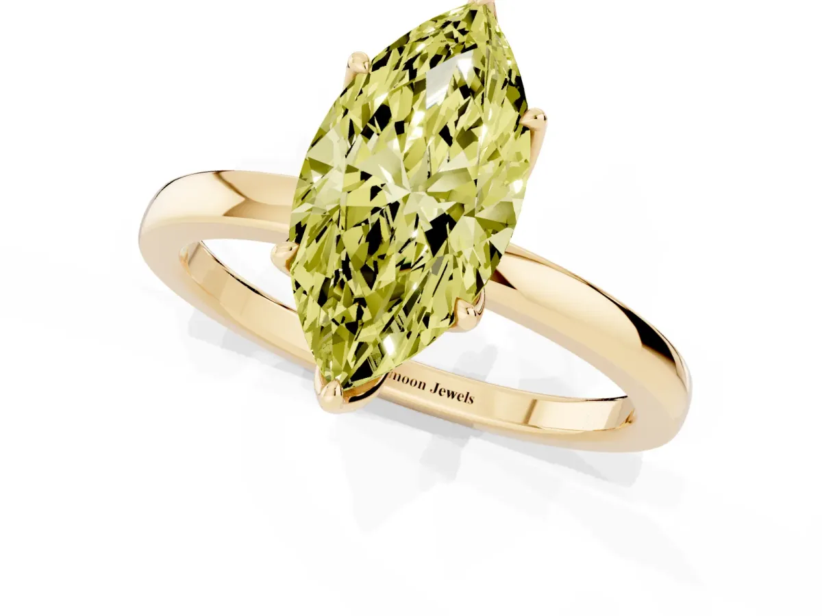 Fancy Yellow Marquise Cut Diamond Solitaire Ring with Thin Band and Prong Setting Yellow gold