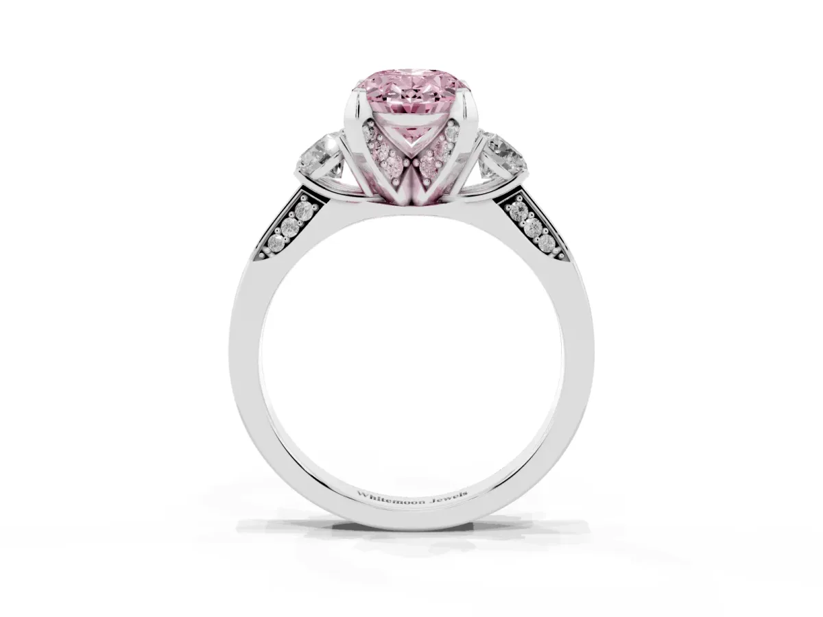 Fancy Pink Oval Cut Brilliant Three-Stone Diamond Ring with Pavé Band and Four-Prong Setting Platinum