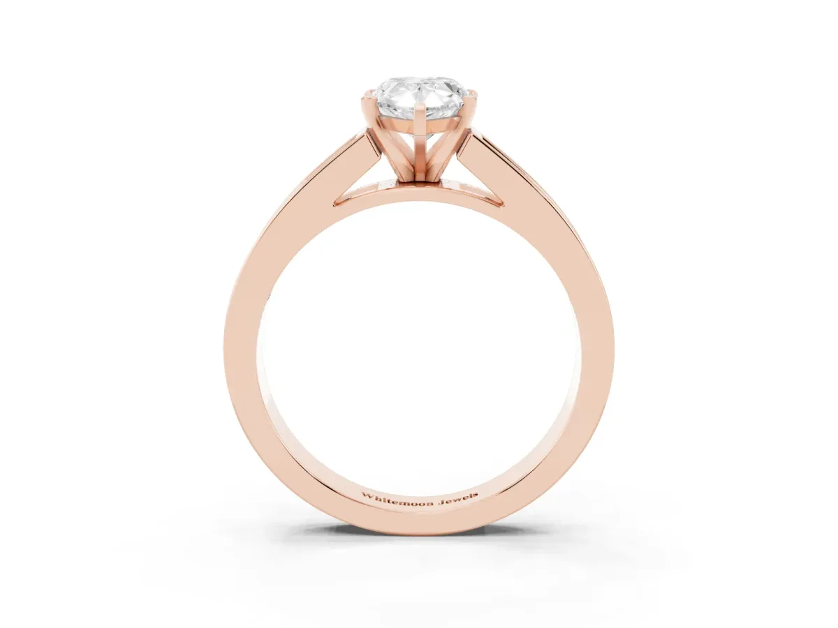 Pear Cut Solitaire Diamond Ring with Channel-Set Band and Four-Prong Setting Rose gold