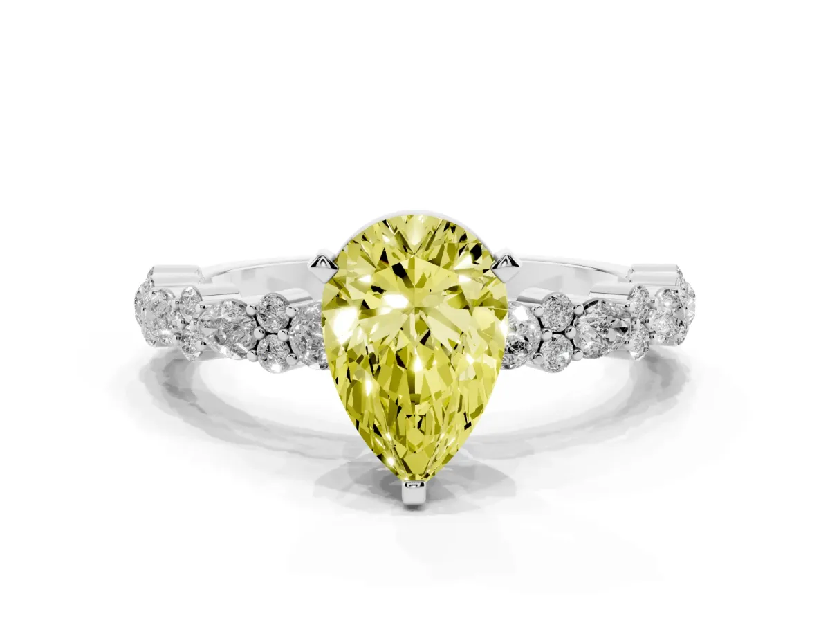 Fancy Yellow Pear Cut Diamond Side Stone Solitaire Ring with Round and Four-Prong Setting Platinum