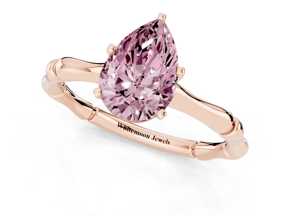 Fancy Pink Pear Cut Solitaire Diamond Ring with Bamboo Band and Four-Prong Setting Rose gold