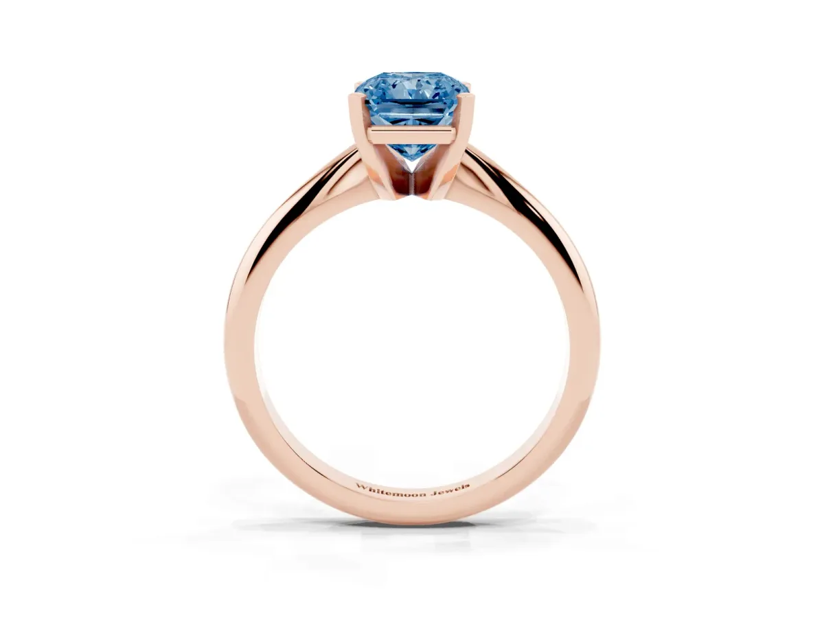 Fancy Blue Radiant Cut Cut Solitaire Ring with Four-Prong Setting on a Classic Band Rose gold