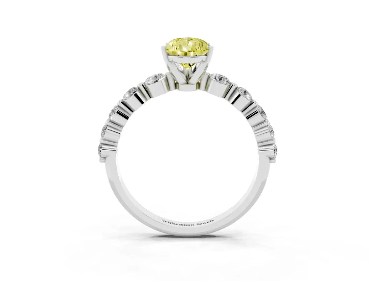 Fancy Yellow Pear Cut Solitaire Diamond Ring with Pave Band and Four-Prong Setting Silver