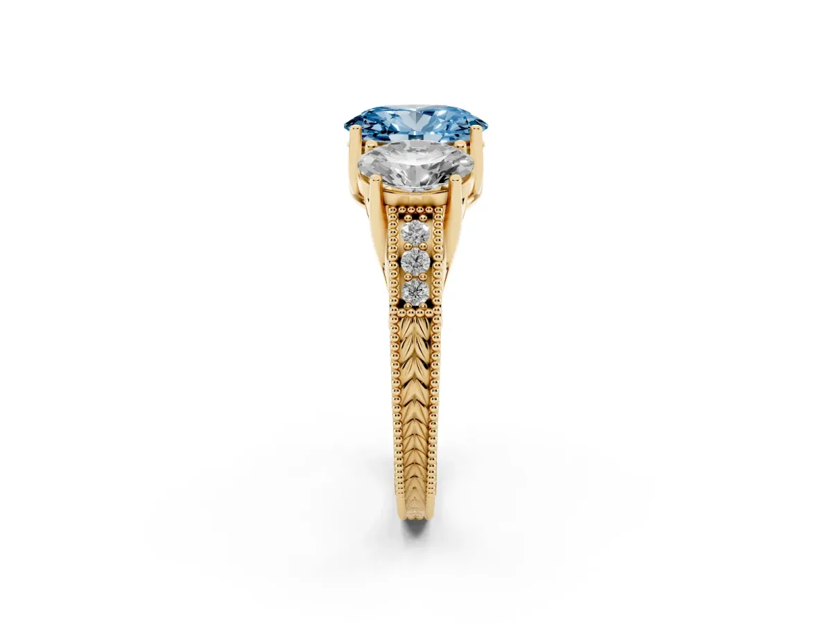 Fancy Blue Three-Stone Oval Cut Cut Milgrain Pavé Engagement Ring Yellow gold