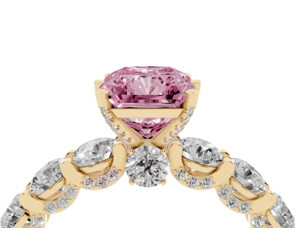 Fancy Pink Radiant Cut Diamond Side Stone Engagement Ring with Four-Prong Setting Yellow gold