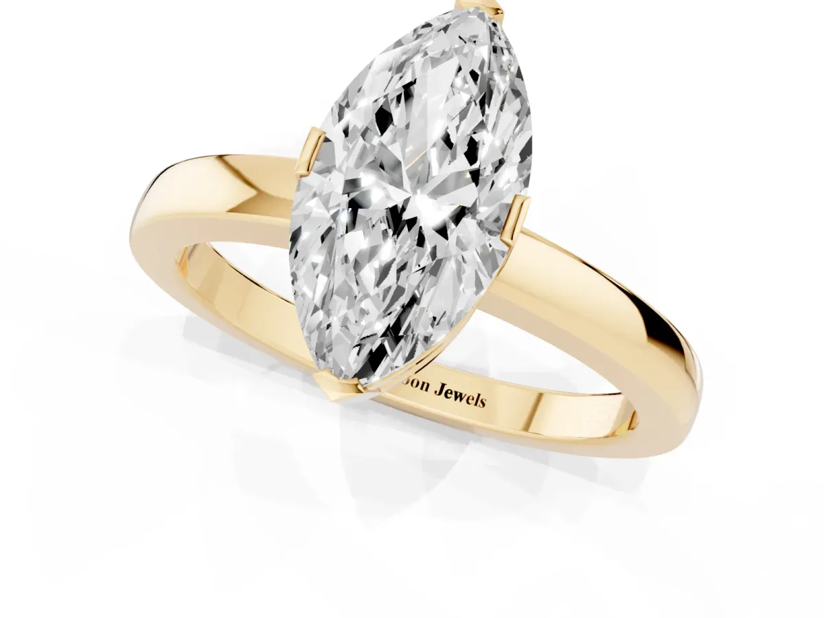 Marquise Cut Cut Solitaire Ring with Four-Prong Setting and Classic Band Yellow gold