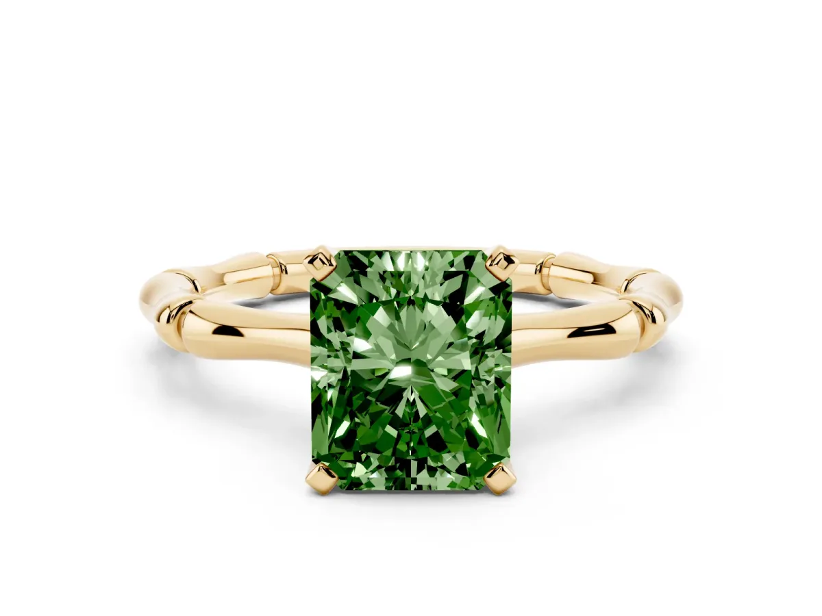 Fancy Green Radiant Cut Solitaire Diamond Ring with Bamboo Band and Four-Prong Setting Yellow gold