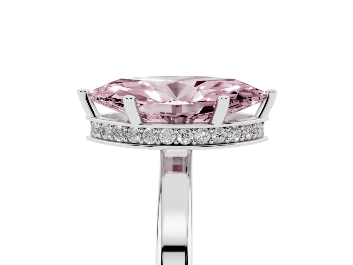 Fancy Pink Marquise Cut Cut Solitaire Engagement Ring with Four-Prong Setting on a Classic Band Silver