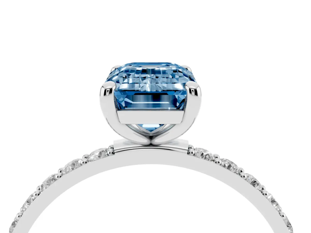 Fancy Blue Emerald Cut Diamond Solitaire Ring with Round Pavé Band and Prong Setting Silver