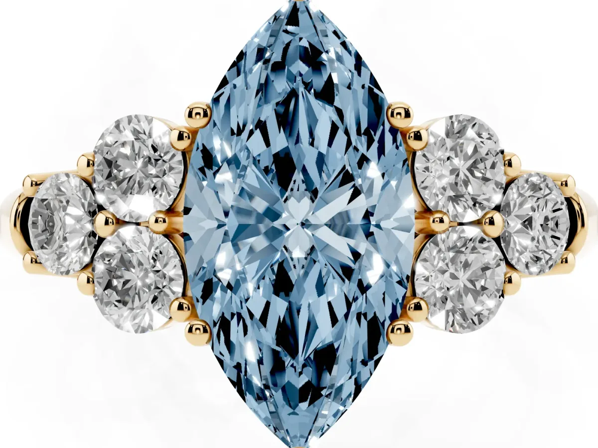 Fancy Blue Marquise Cut Cut Diamond Cluster Ring with Round Accent Stones and Prong Setting on a Classic Band Yellow gold