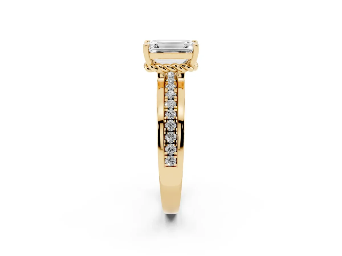 Emerald Cut Solitaire Diamond Ring with Channel Set Band and Six-Prong Setting Yellow gold