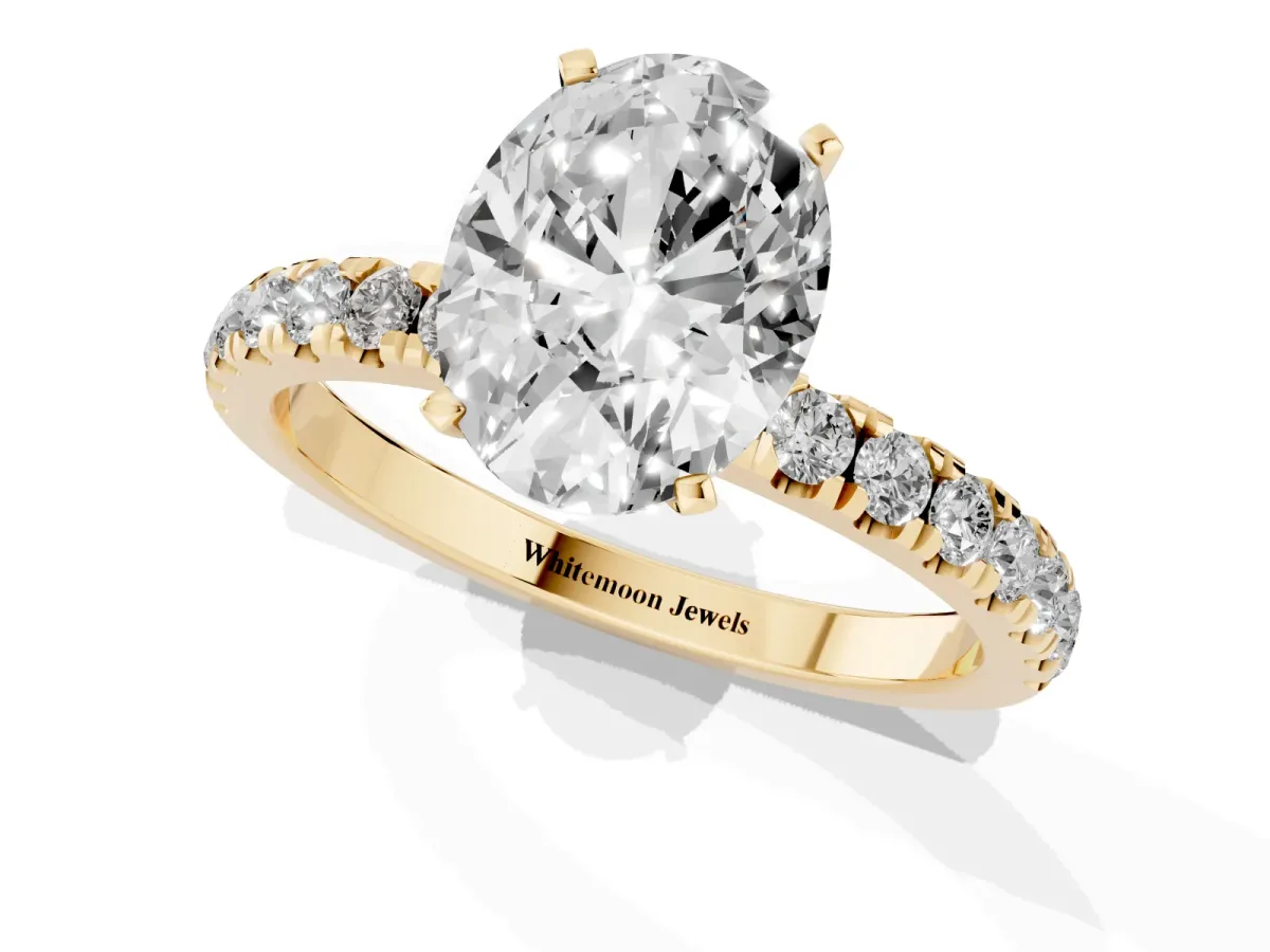 Oval Cut Diamond Solitaire Ring with Pavé Accents and Four-Prong Setting Yellow gold