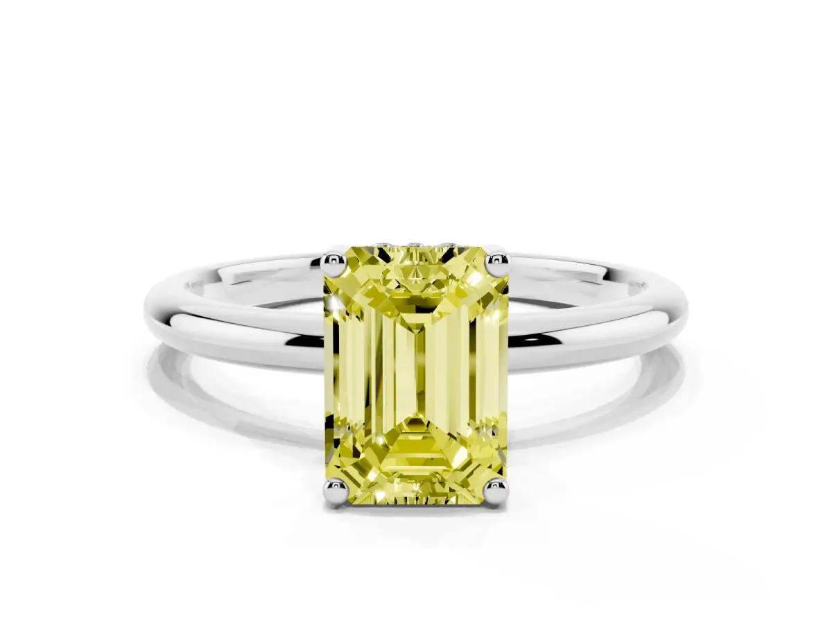 Fancy Yellow Emerald Cut Cut Solitaire Engagement Ring with Four-Prong Setting and Classic Band Silver