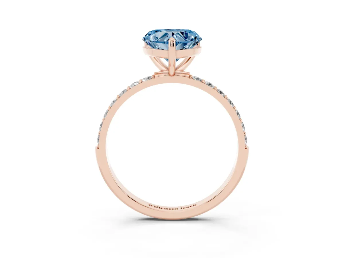 Fancy Blue Heart Cut Diamond Solitaire Ring with Round Pavé Band and Prong Setting Rose gold