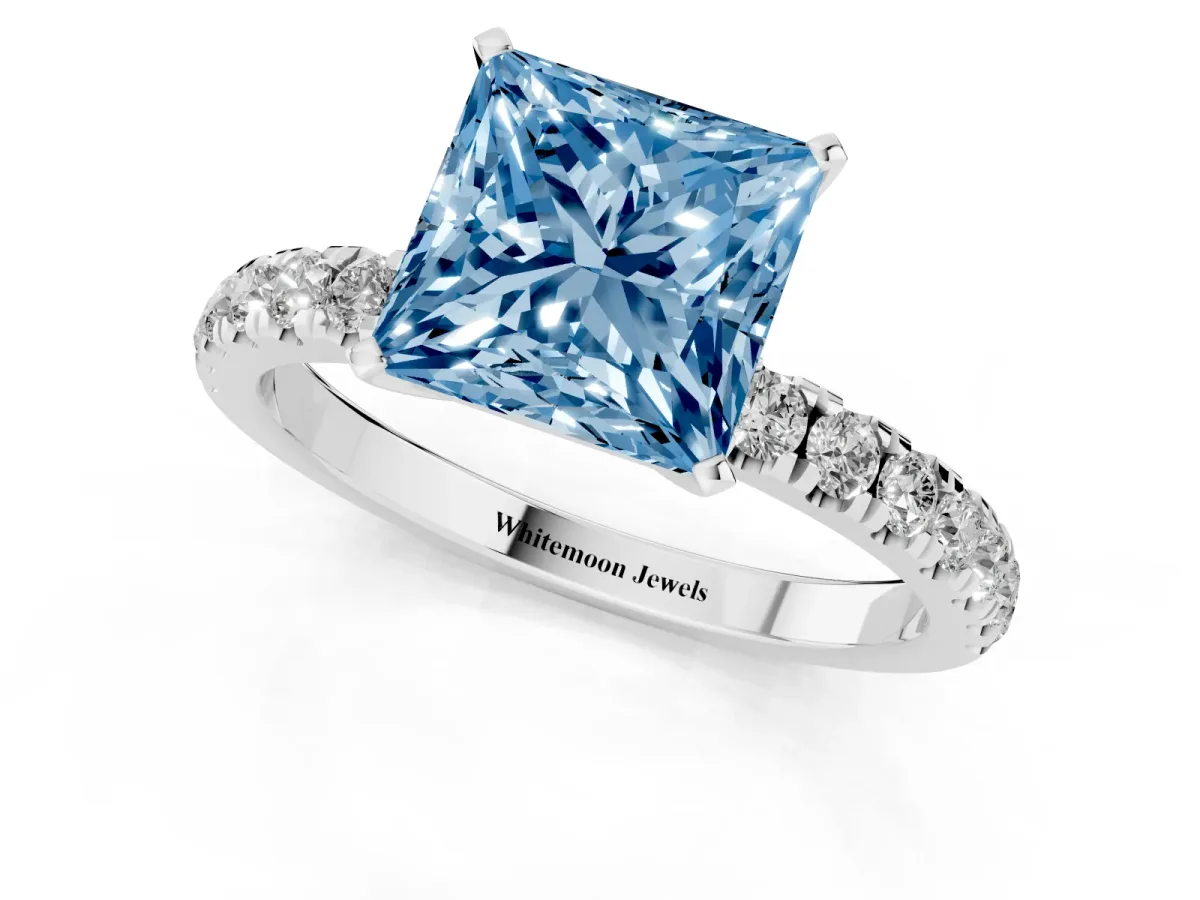 Fancy Blue Princess Cut Diamond Solitaire Ring with Pavé Accents and Four-Prong Setting Platinum